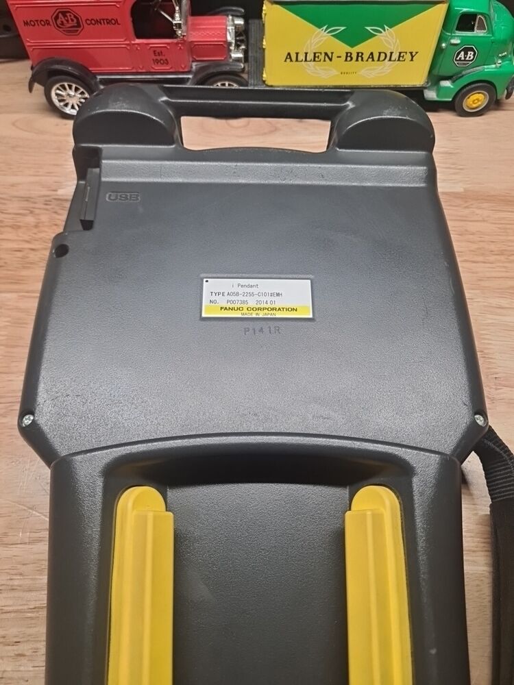 FANUC A05B-2255-C101#EMH Teach Pendant, gray with yellow accents. Includes USB port, made by FANUC.