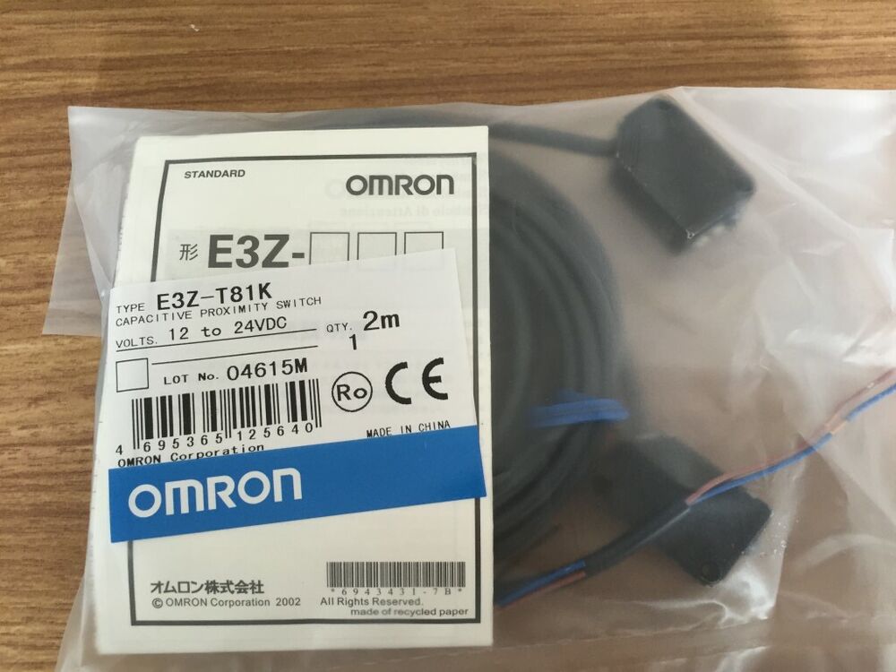 Omron E3Z-T81K capacitive proximity switch in packaging, 12 to 24VDC sensor
