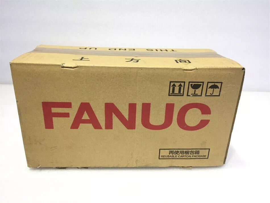 FANUC servo motor product packaging box. Cardboard box with FANUC logo, for robot and industrial automation spare parts.
