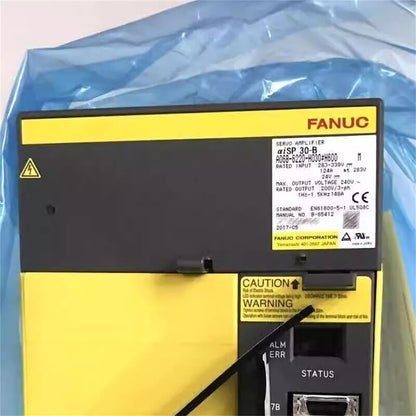FANUC A06B-6220-H030#H600 Servo Drive, New in Box. Features product label, model number, and production date.