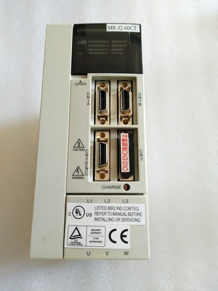 Mitsubishi MR-J2-60CT servo drive unit, featuring multiple ports and safety certifications, ideal for industrial automation.