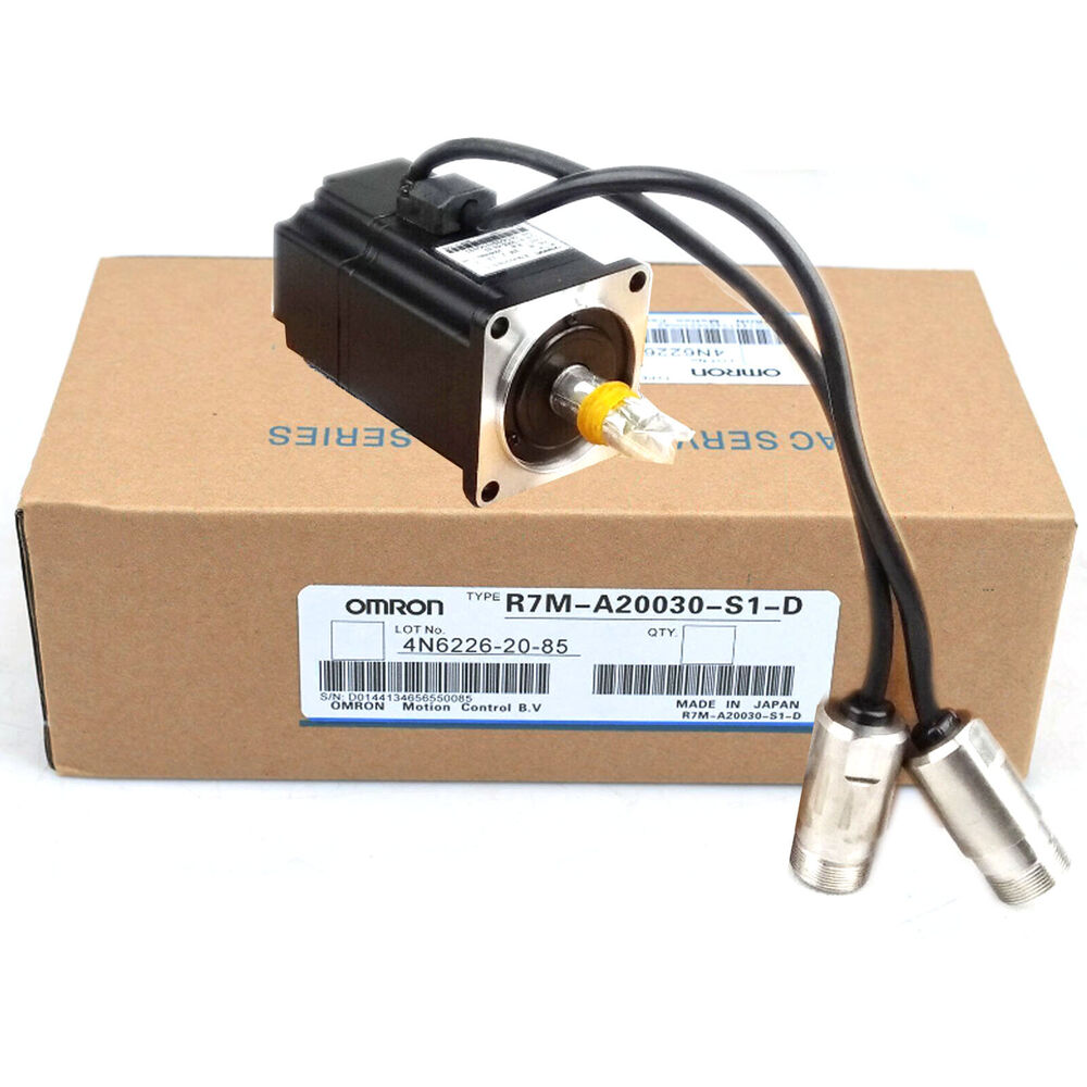 Omron R7M-A20030-S1-D servo motor on box, industrial automation part. Black motor with cables, Made in Japan.