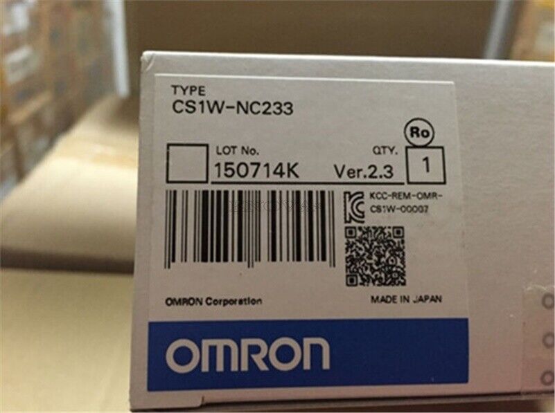 Omron CS1W-NC233 PLC Controller box, featuring product details, Lot No. 150714K, and Made in Japan