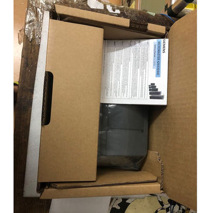 Siemens MICROMASTER 420 drive in its box, with manuals. Industrial automation equipment.