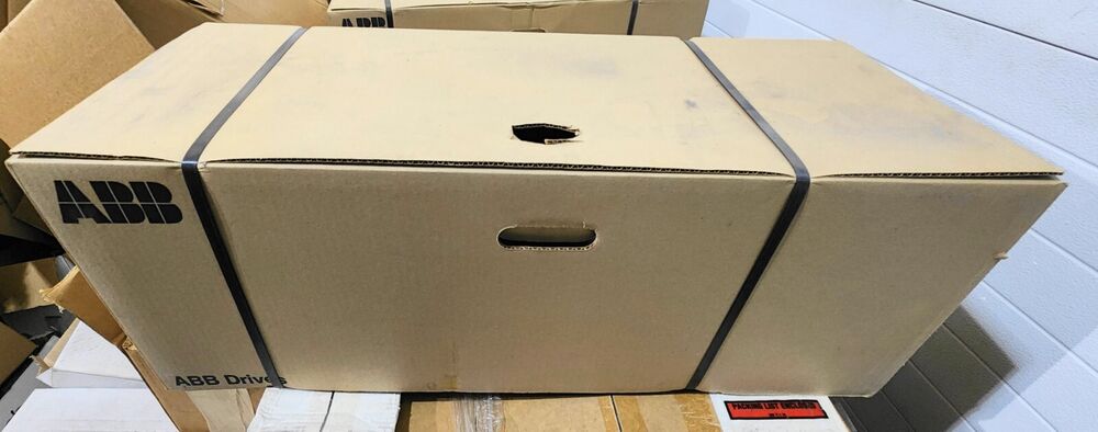 ABB ACH550-UH-08A8-4+B055 VFD box, packaged with black straps, brown cardboard, ABB Drives label visible.