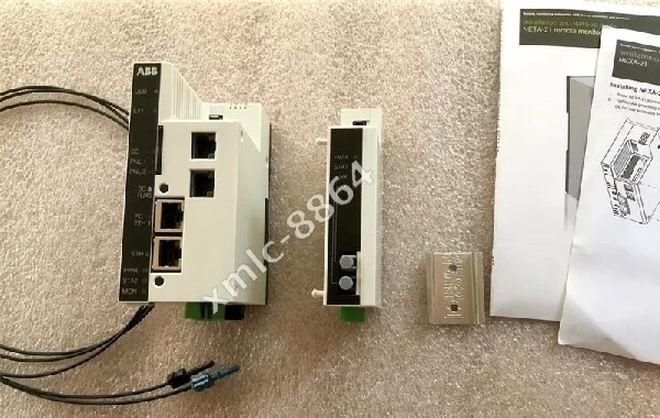 ABB industrial automation equipment, including Ethernet ports, status indicators, and a NETA-21 remote monitor.