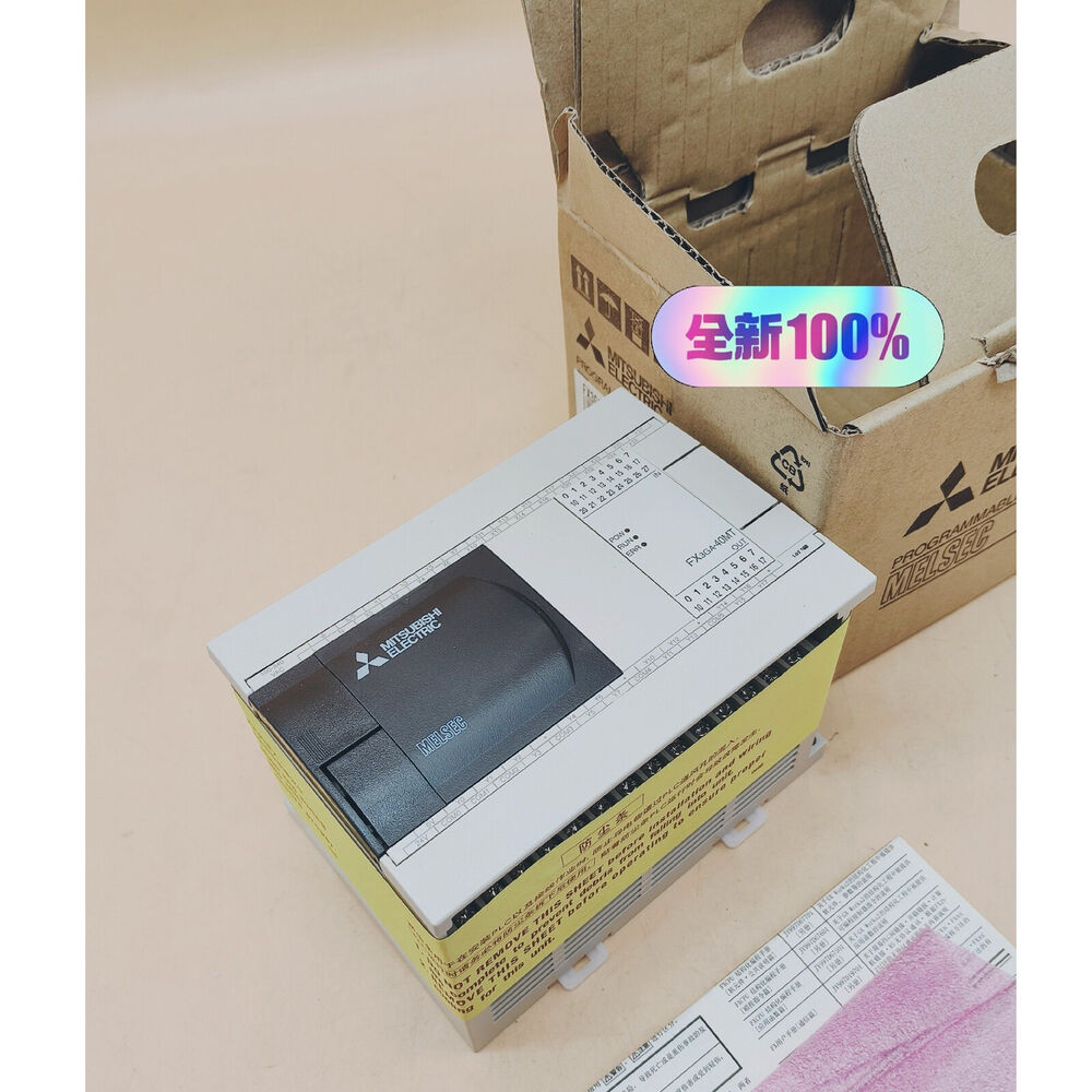 Mitsubishi FX3GA-40MT-CM PLC module in box, new product with 100% guarantee, Overhead view