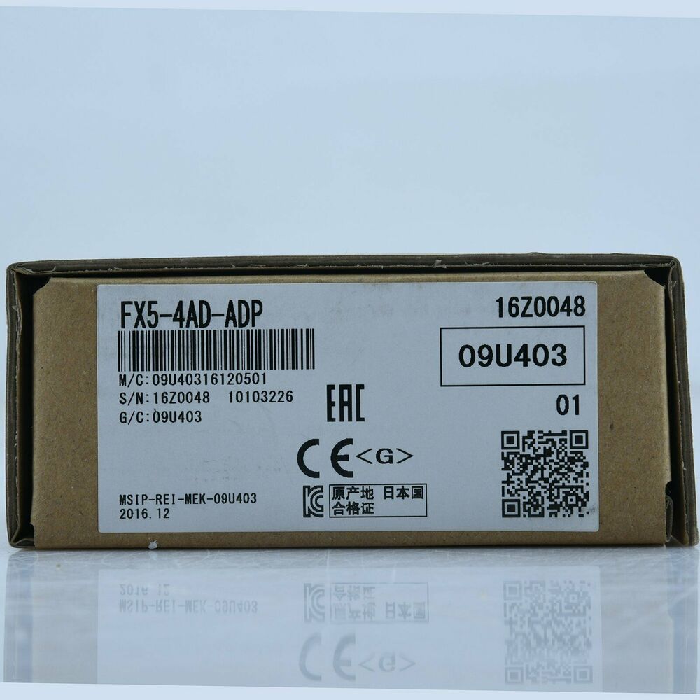 Mitsubishi FX5-4AD-ADP PLC module box. 09U403 and 16Z0048 serial numbers. Industrial automation part.