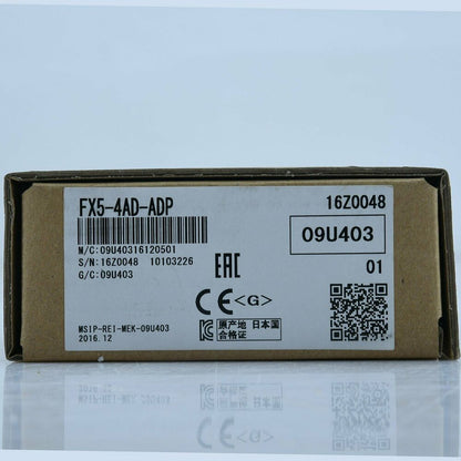 Mitsubishi FX5-4AD-ADP PLC module box. 09U403 and 16Z0048 serial numbers. Industrial automation part.