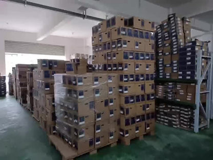 Mitsubishi HF-SP81MK-S2 servo motor boxes stacked in a warehouse, ready for fast shipping.