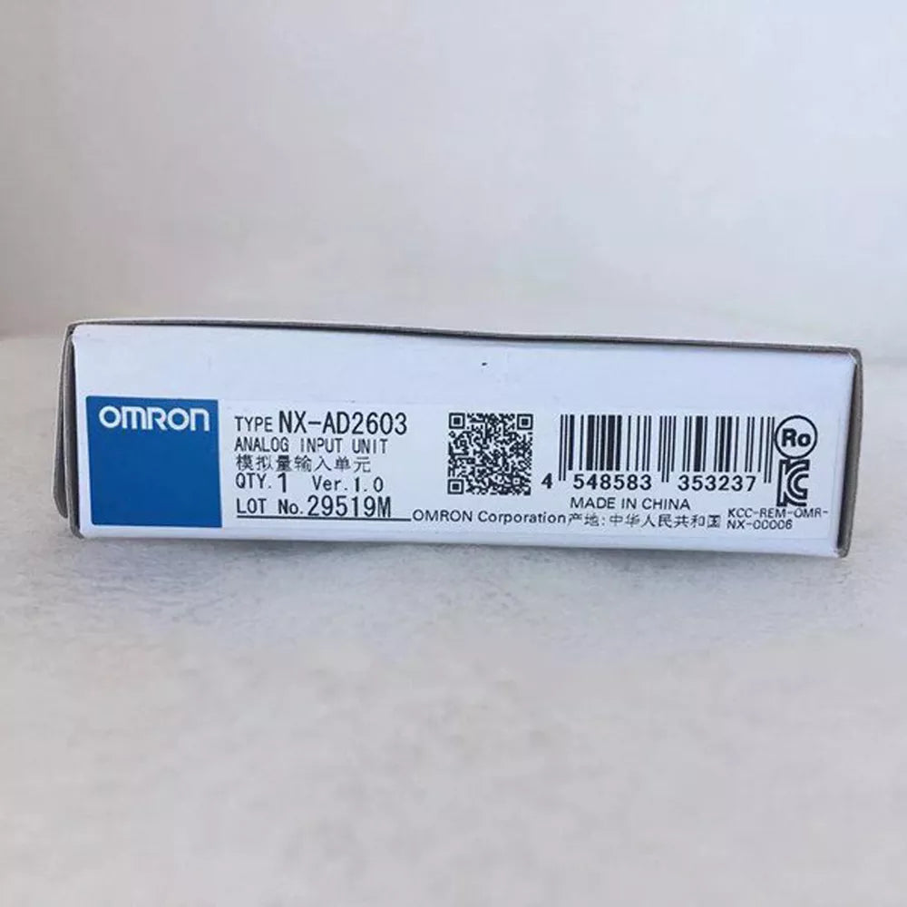 Omron NX-AD2603 Analog Input Unit box, featuring product details and barcode.