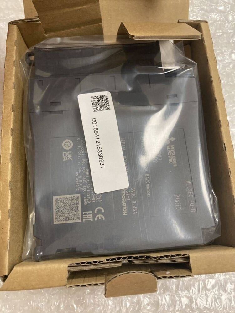 Mitsubishi MELSEC iQ-R PLC module in box, new condition, model: TQ-R, featuring product information and serial number.