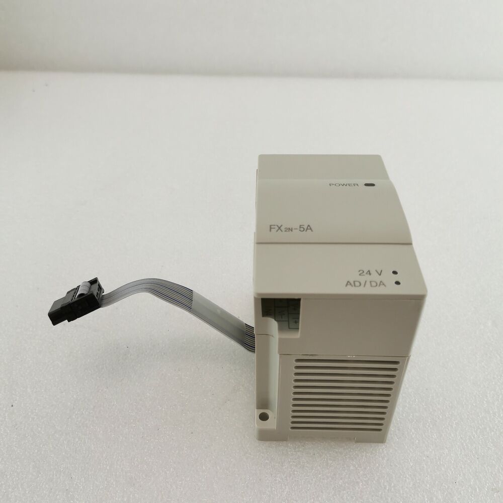 Mitsubishi FX2N-5A PLC module, beige, with 24V AD/DA and power indicator.