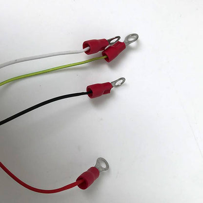 Close-up of electrical wires with red connectors, likely for FANUC spindle motor, on white background. Wiring and terminals.