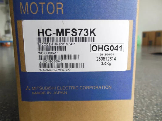 Mitsubishi HC-MFS73K servo motor box details, including model number, specifications, and "MADE IN JAPAN".