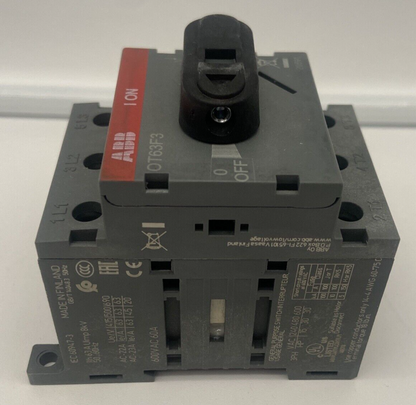 ABB OT63F3 Disconnector Switch, gray body with black handle, ON/OFF status indicator, and specifications details.
