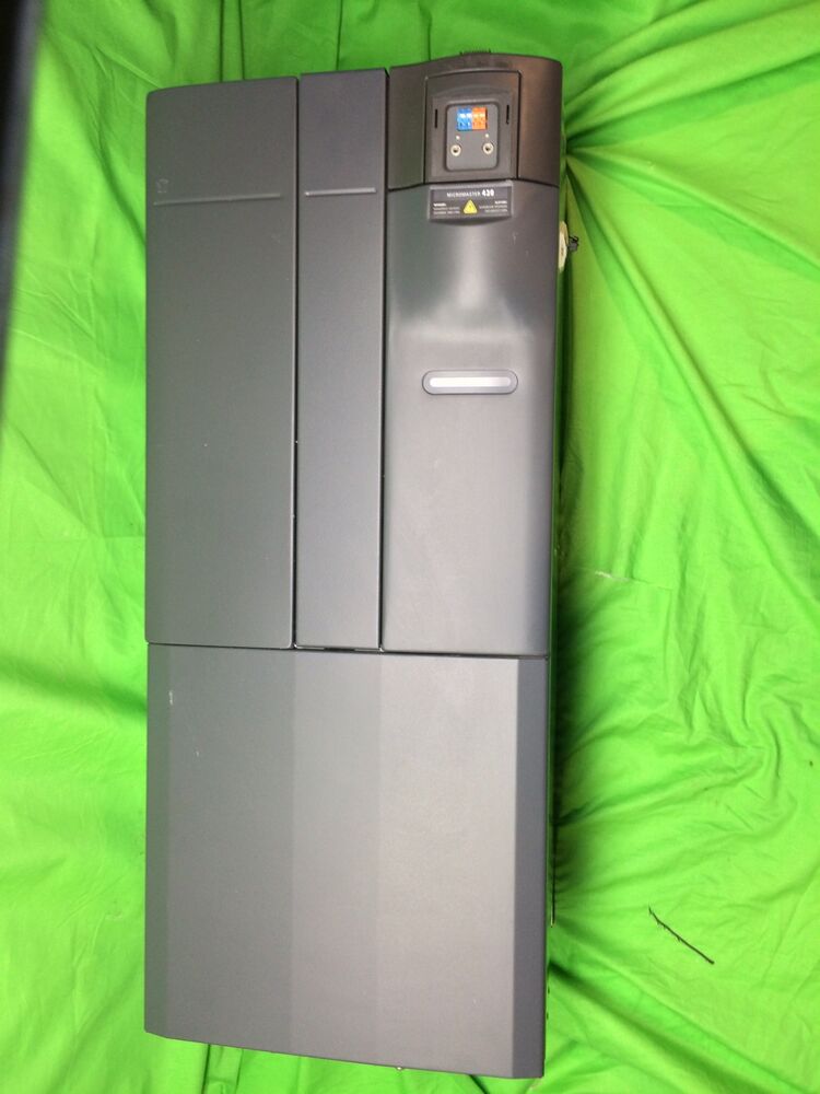 Siemens MICROMASTER 430 Drive, part number 6SE6430-2UD38-8FA0, industrial automation component with a digital display.