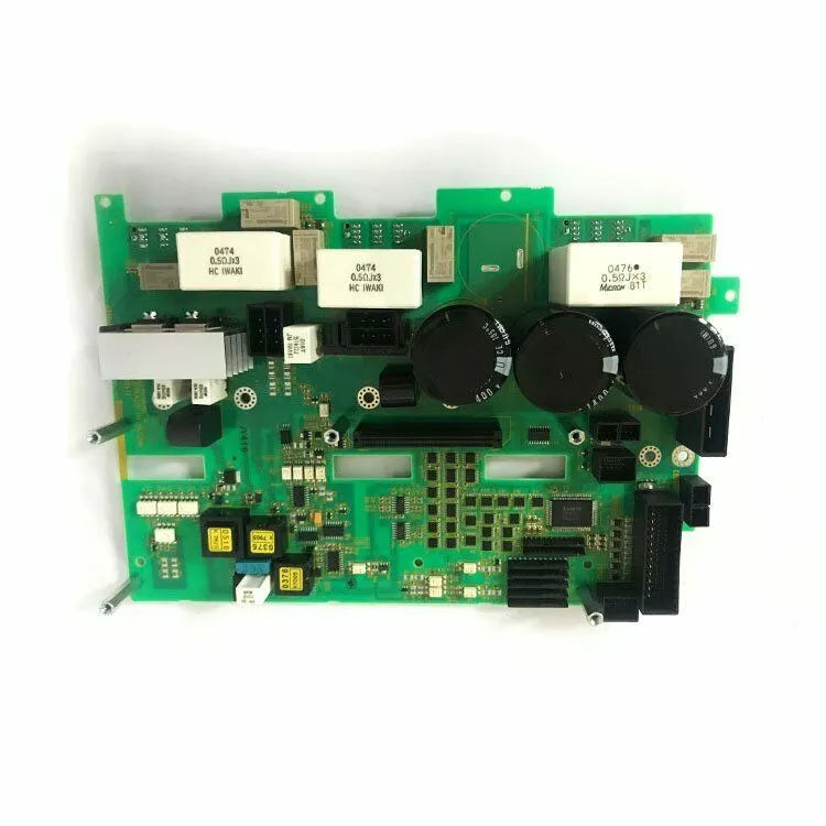 FANUC A20B-8101-0802 Circuit Board. Green PCB with electronic components and capacitors. Includes HC IWAKI and Micron G11.