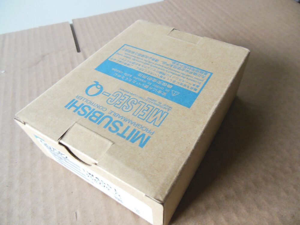 Mitsubishi MELSEC-Q Programmable Controller box on cardboard. New PLC part.