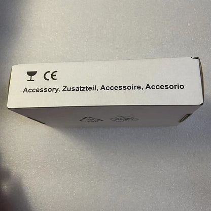 White cardboard box with CE mark and Accessory label for industrial automation parts.