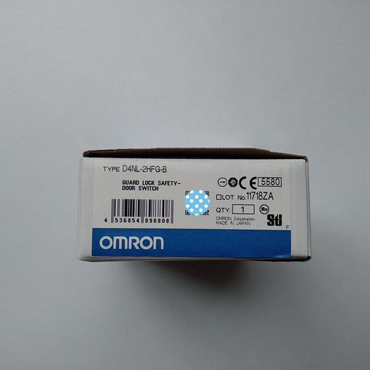 OMRON D4NL-2HFG-B safety door switch on a white box. Industrial automation sensor for sale.