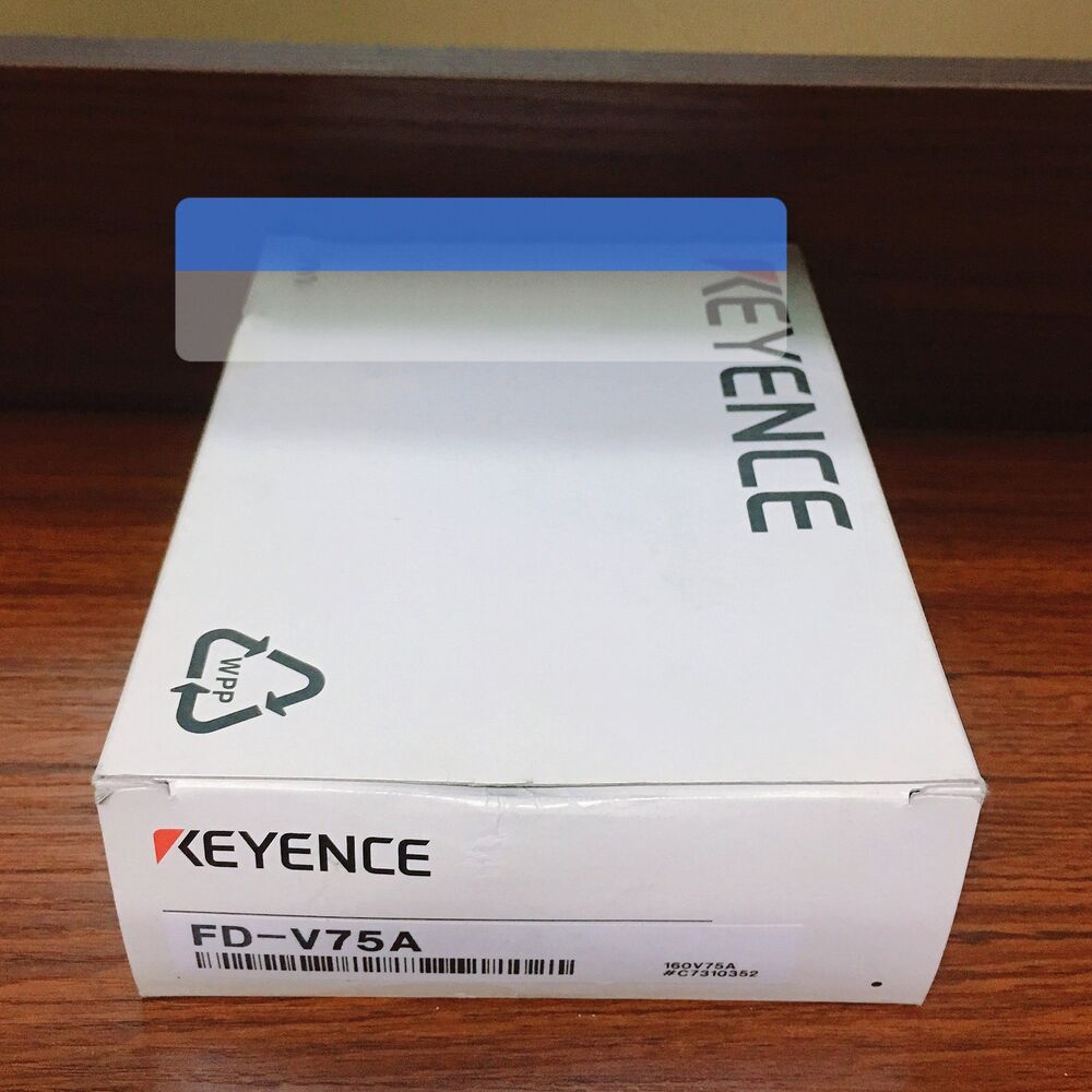 Keyence FD-V75A air flow sensor box, new in box, featuring the brand logo and product information.