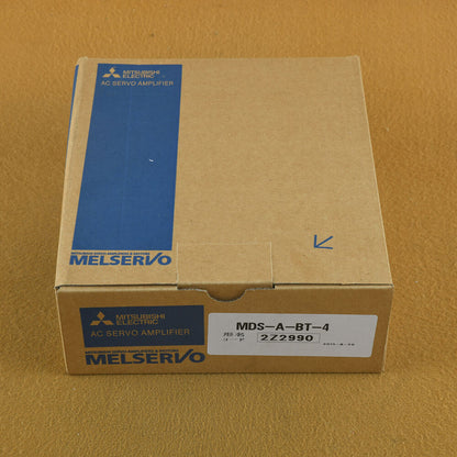 Mitsubishi MDS-A-BT-4 Servo Driver in box. Featuring the product name and specifications for industrial automation.