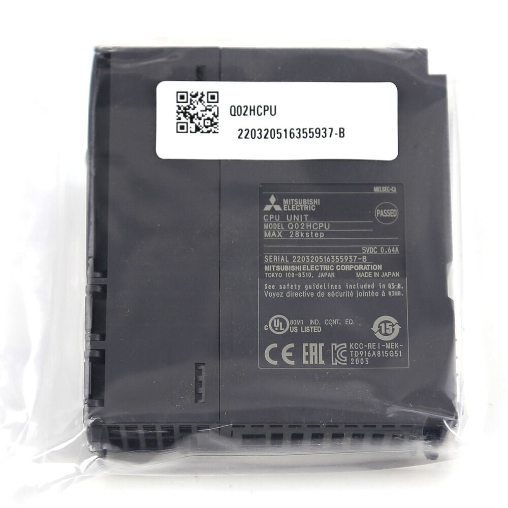 Mitsubishi Q02HCPU PLC Module in packaging. Industrial automation part, model Q02HCPU, MAX 28kstep.