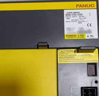 FANUC A06B-6150-H060 Servo Drive Amplifier, yellow and gray industrial automation equipment, visible labels.