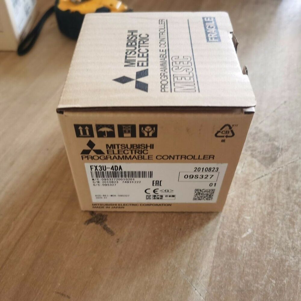 Mitsubishi FX3U-4DA PLC Analog Module in its original cardboard box, new in box. Fast shipping.