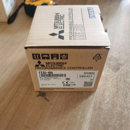 Mitsubishi FX3U-4DA PLC Analog Module in its original cardboard box, new in box. Fast shipping.