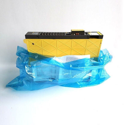 New FANUC A06B-6079-H206 Servo Amplifier, yellow module in blue packaging, industrial automation part.