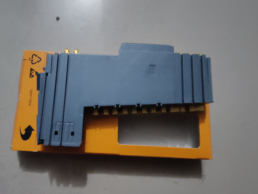 New B&R X20BT9100 PLC Module, industrial automation part, grey and yellow packaging, "open here" label, X20 BT 9100