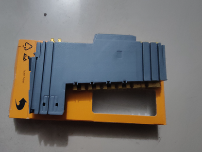 New B&R X20BT9100 PLC Module, industrial automation part, grey and yellow packaging, "open here" label, X20 BT 9100