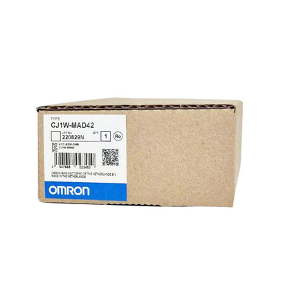 Omron CJ1W-MAD42 Analog I/O Unit box. New in box, featuring product details and barcode.