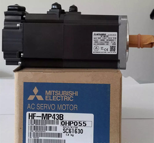 Mitsubishi HF-MP43B AC Servo Motor in box. Industrial automation equipment, model HFMP43B.