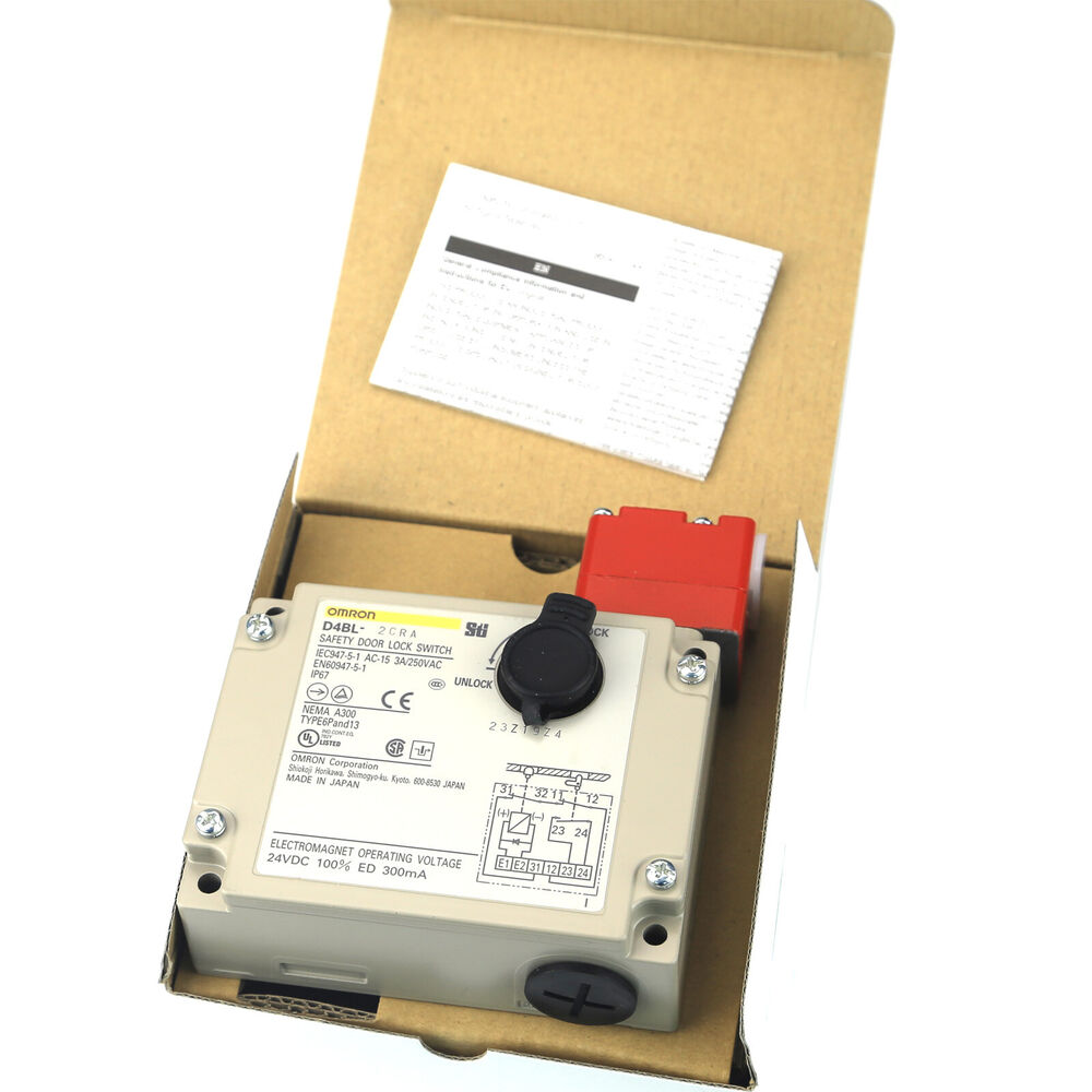 New OMRON D4BL-2CRA Safety Door Lock Switch in box. Beige housing, red component, black knob, 24VDC, IP67.