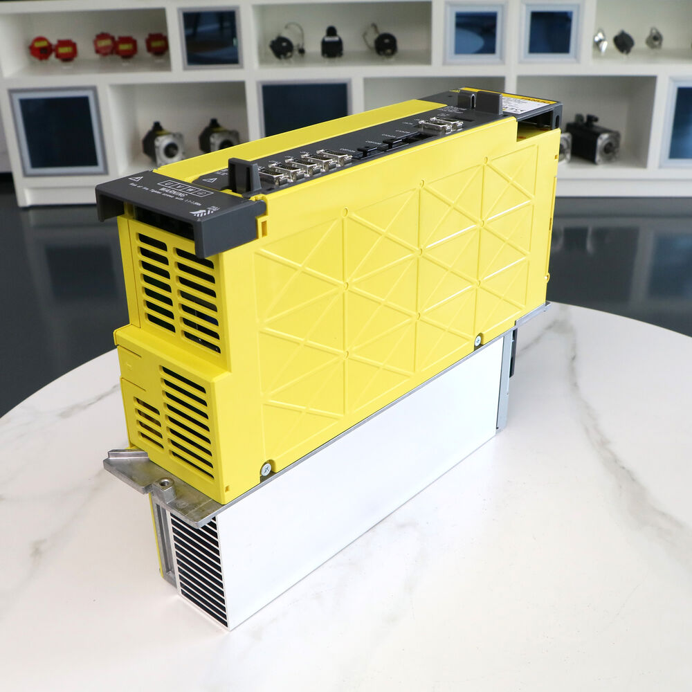 FANUC A06B-6220-H015#H600 Servo Drive Amplifier, yellow and white industrial automation part.