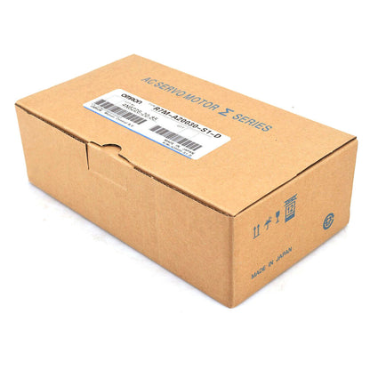 Omron R7M-A20030-S1-D servo motor in cardboard box. AC Servo Motor ∑ Series, Made in Japan.