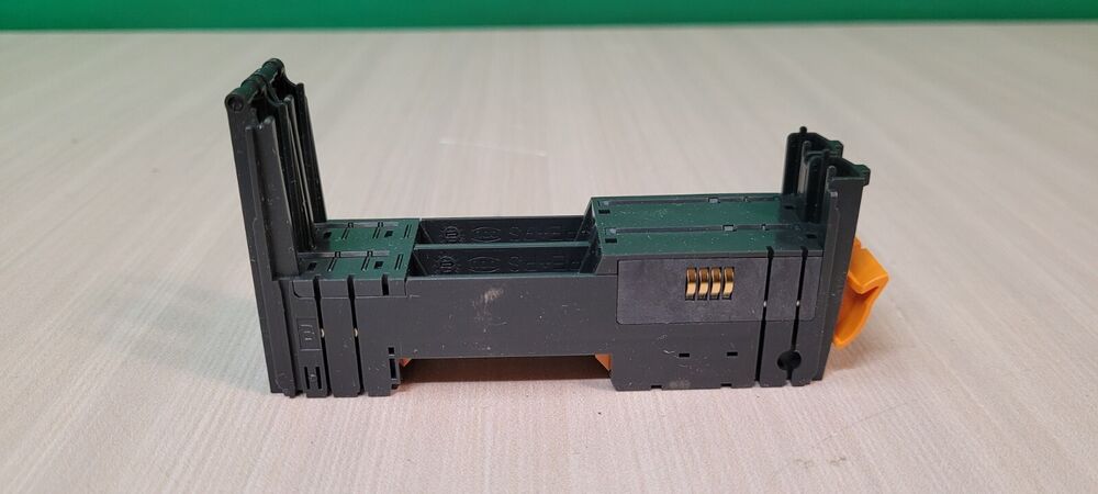 B&R X20BM31 backplane module, black and green plastic, orange clip, industrial automation component.