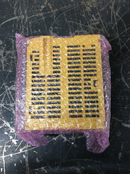 FANUC A02B-0236-C205 Position Detect Module, yellow PLC component wrapped in bubble wrap, industrial automation part.
