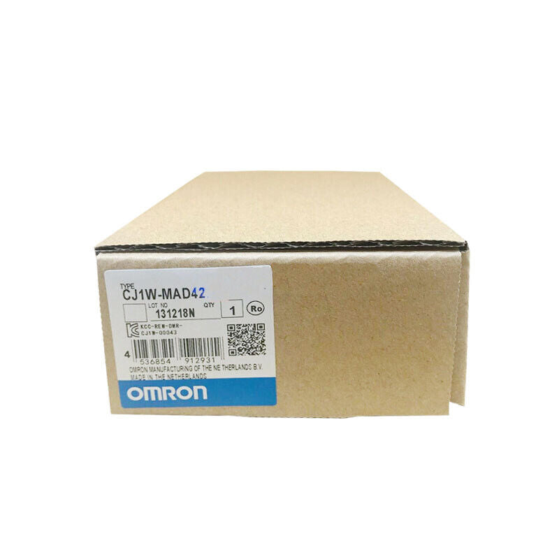 Omron CJ1W-MAD42 Analog I/O Unit in box. Dutch-made industrial automation part, featuring product details and barcode.