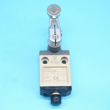 Omron D4CC-3024 limit switch sensor with lever arm, industrial automation component, Made in Japan.