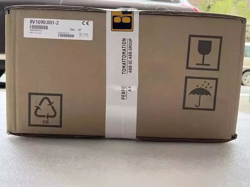 B&R Servo Motor 8V1090.001-2 in original packaging with handling instructions, product code label, and TOMATTOMATION label