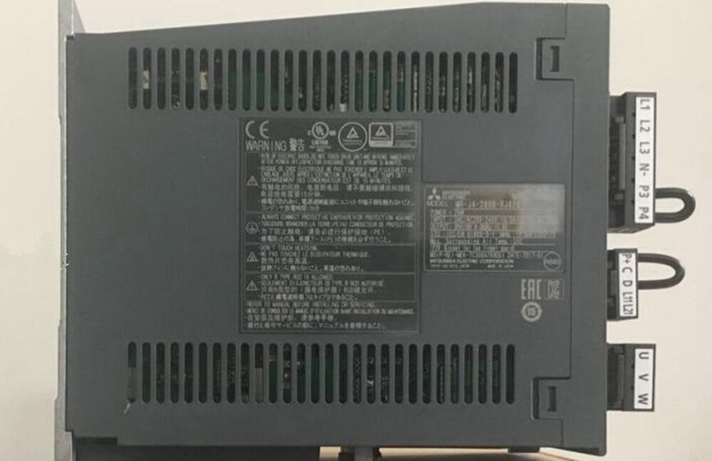 Mitsubishi MR-J4-200B-RJ020 Servo Drive, rear view with warnings and connectors, industrial automation part