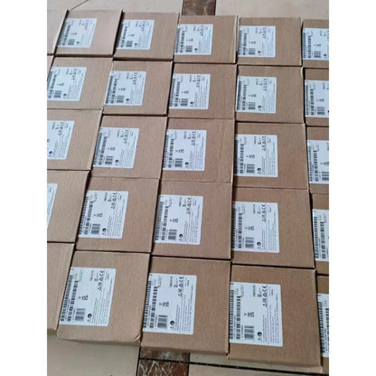 Boxes of ABB C2SS1-10B-10 selector switches, brown cardboard packaging, industrial automation parts, warehouse stock.