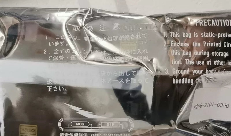 FANUC A20B-2101-0390 Control Board in static-protective bag with precaution labels.