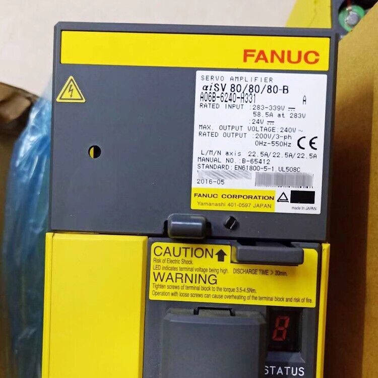 FANUC A06B-6240-H331 Servo Amplifier, yellow and gray, with product information, caution and warning labels. Fast shipping.