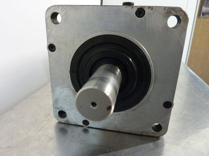 Fanuc A06B-0151-B077 servo motor, metal housing, black seal, cylindrical shaft, industrial automation equipment.