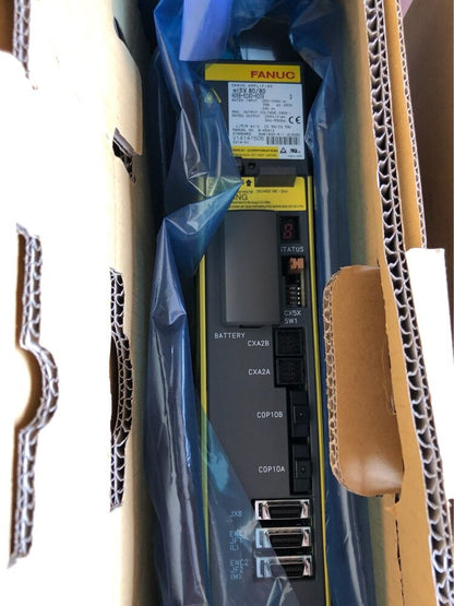 FANUC A06B-6240-H209 Servo Drive, new in box. Industrial automation component with labels.